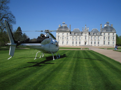 VIP excursion Loire valley castles: Cheverny and Beauregard by a Private Helicopter, thanks to Private Jet Charter service from AB Corporate Aviation, showing loire-valley-castles-cheverny-outside-helicopter.