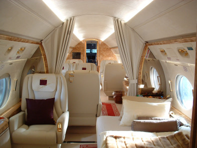 Gulfstream v flying interior cabin, Cost to book a private jet
